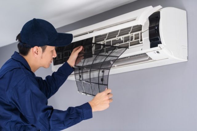 technician-service-removing-air-filter-air-conditioner-cleaning_35076-3617-640x426-1